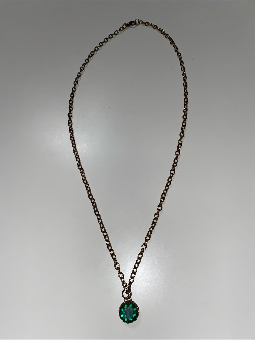 Gold-Tone Necklace with Emerald Green Crystal Pendant